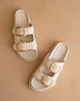 The Daytona | Ivory aTwo-Tone Raffia Gold Buckle Sandal