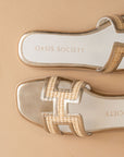The Ena | Gold H Cutout Raffia Slide