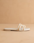 The Ena | White H Cutout Raffia Slide