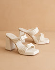 The Faith | White Knotted band platform snake-print heel