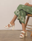 The Faith | White Knotted band platform snake-print heel