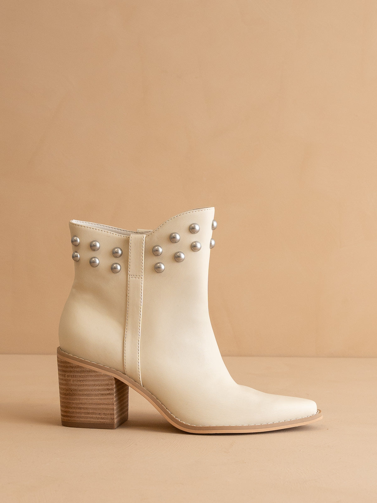 The Alofi | Beige Elegant bootie with metallic stud collar