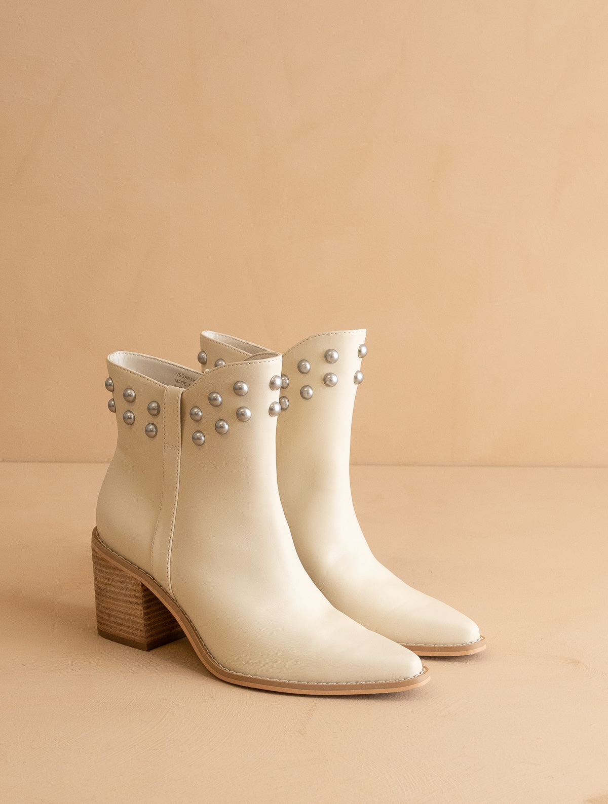 The Alofi | Beige Elegant bootie with metallic stud collar