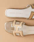 The Ena | Gold H Cutout Raffia Slide