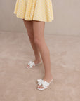 The Ginny | White Textured Bow Slide
