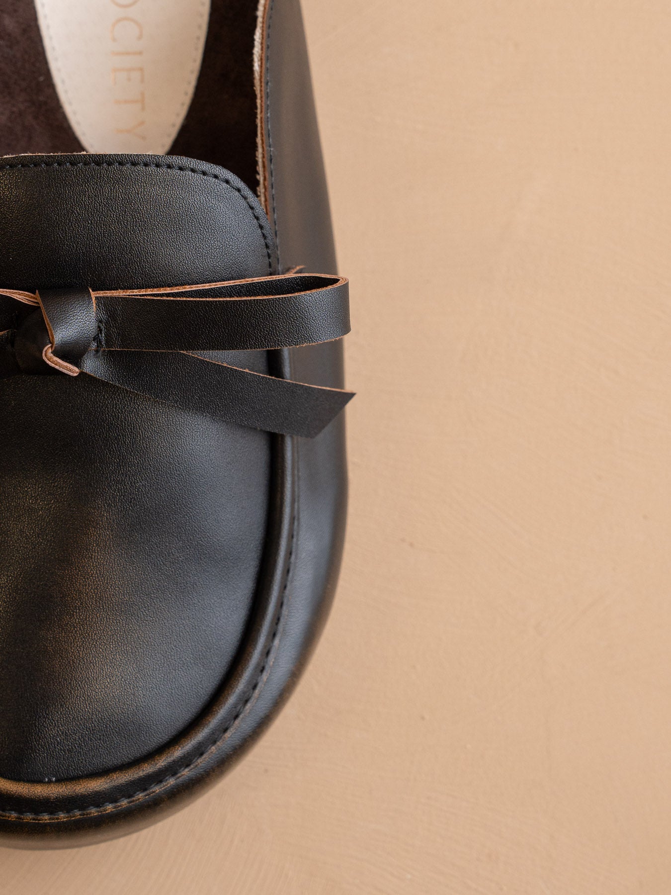 The Stevie | Distressed Black Tie Mule Loafer